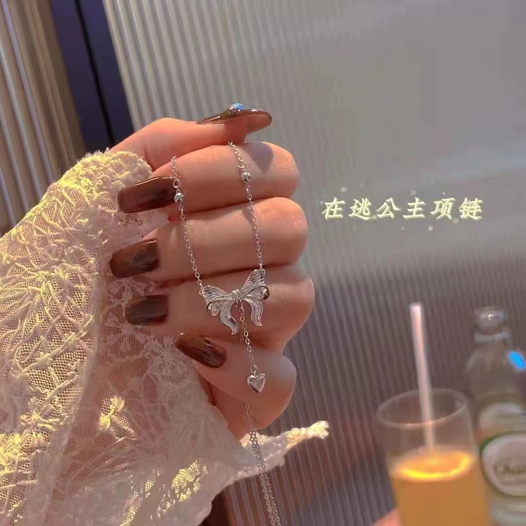坠链均足银 990超仙在逃公主蝴蝶结女纯银项链小众轻奢锁骨链素款