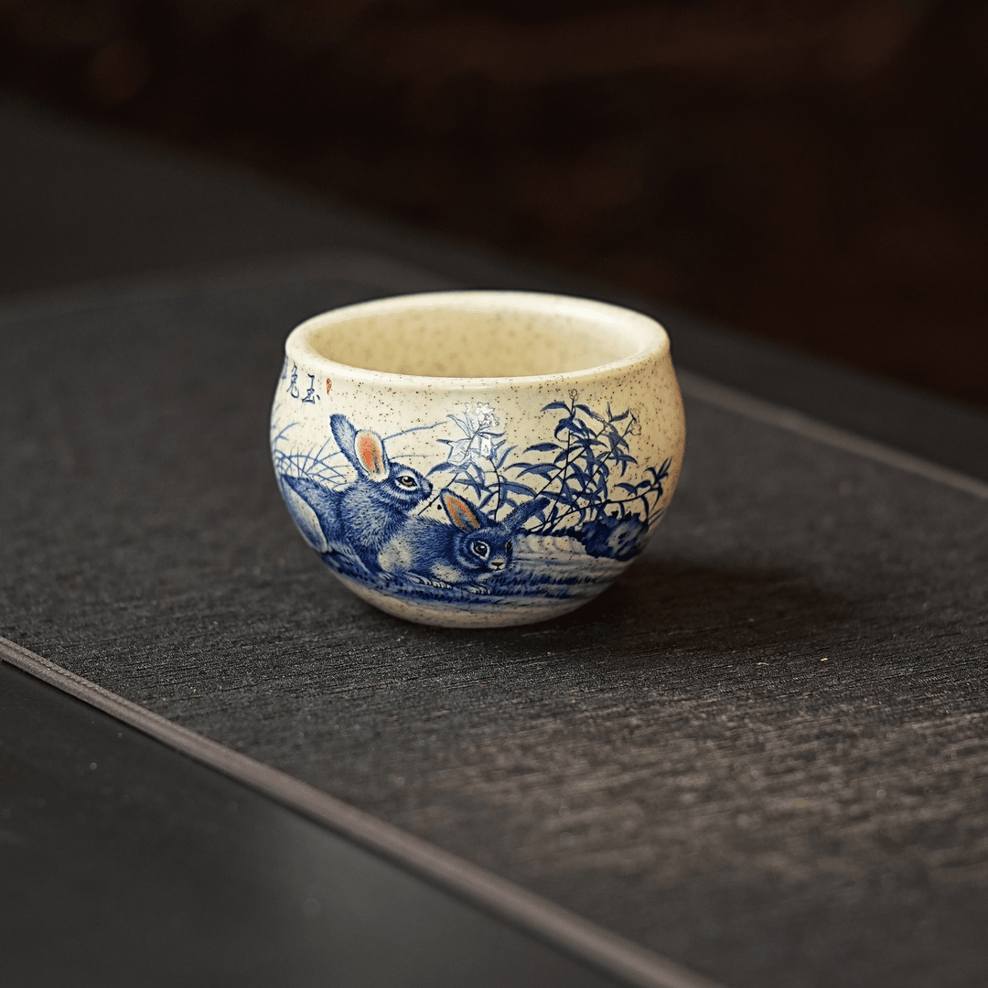 宜兴原矿羊脂白玉段手工刻绘玉兔呈祥紫砂主人杯 ZYL 1123