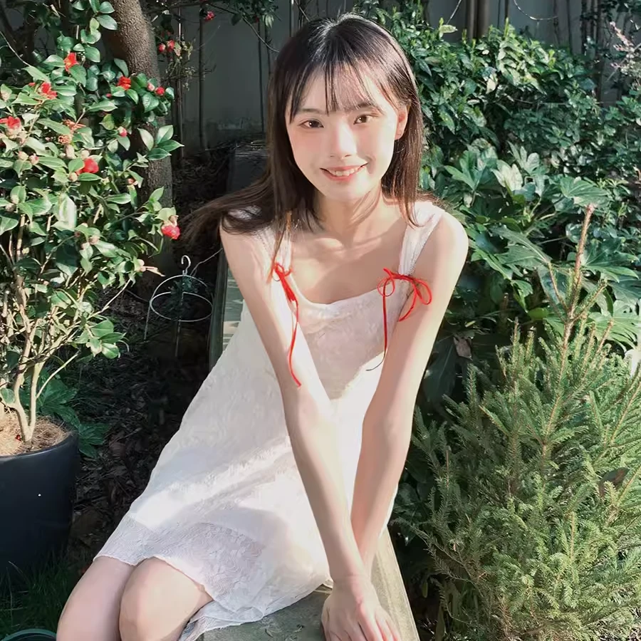 南西 红丝带蕾丝裙不规则下摆