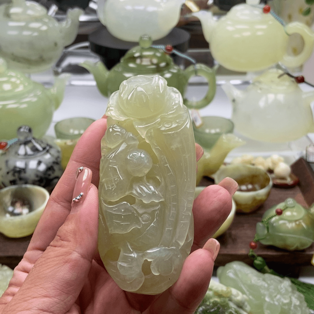 蛇纹石玉手把件未镶嵌