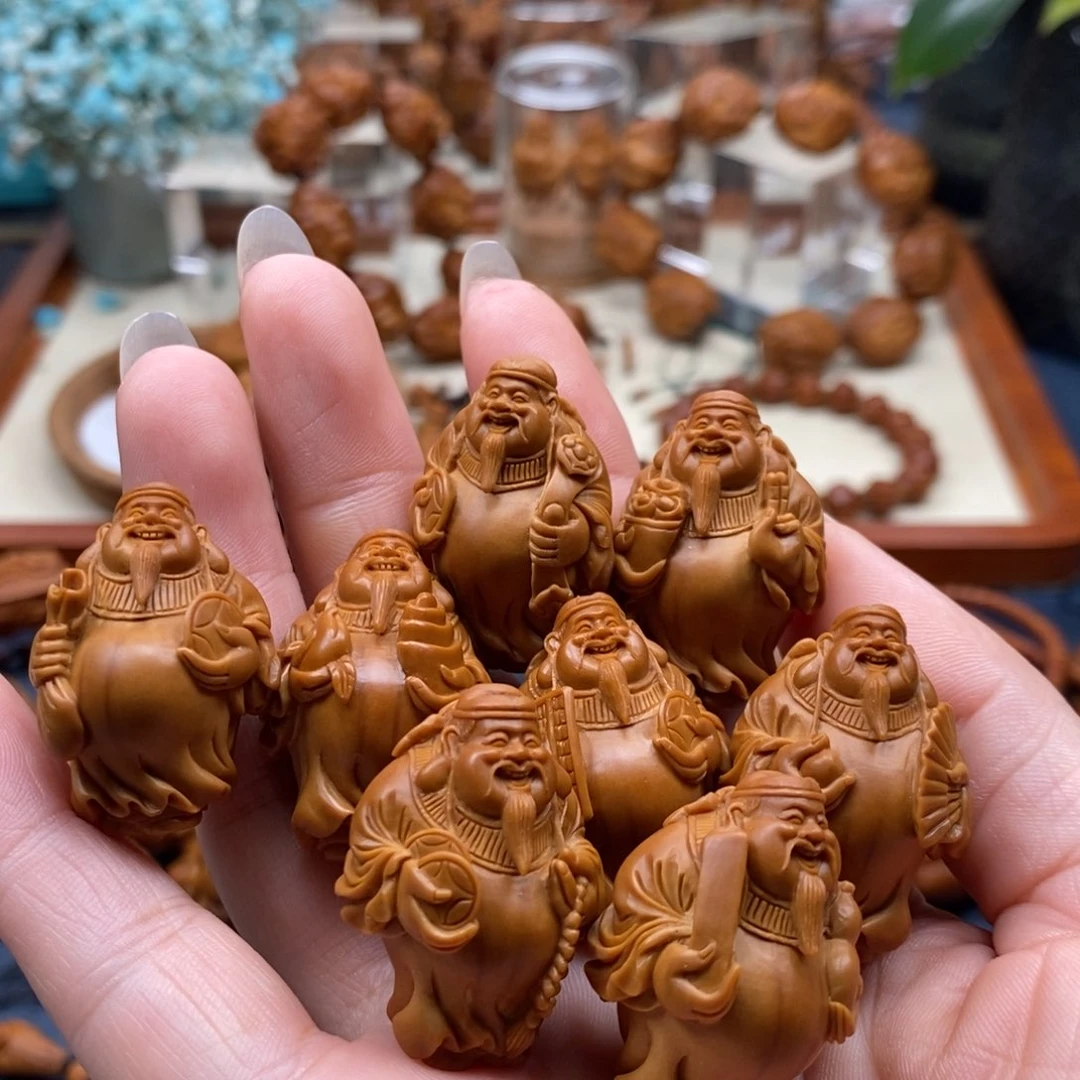 橄榄核核雕无**瘾财神手串