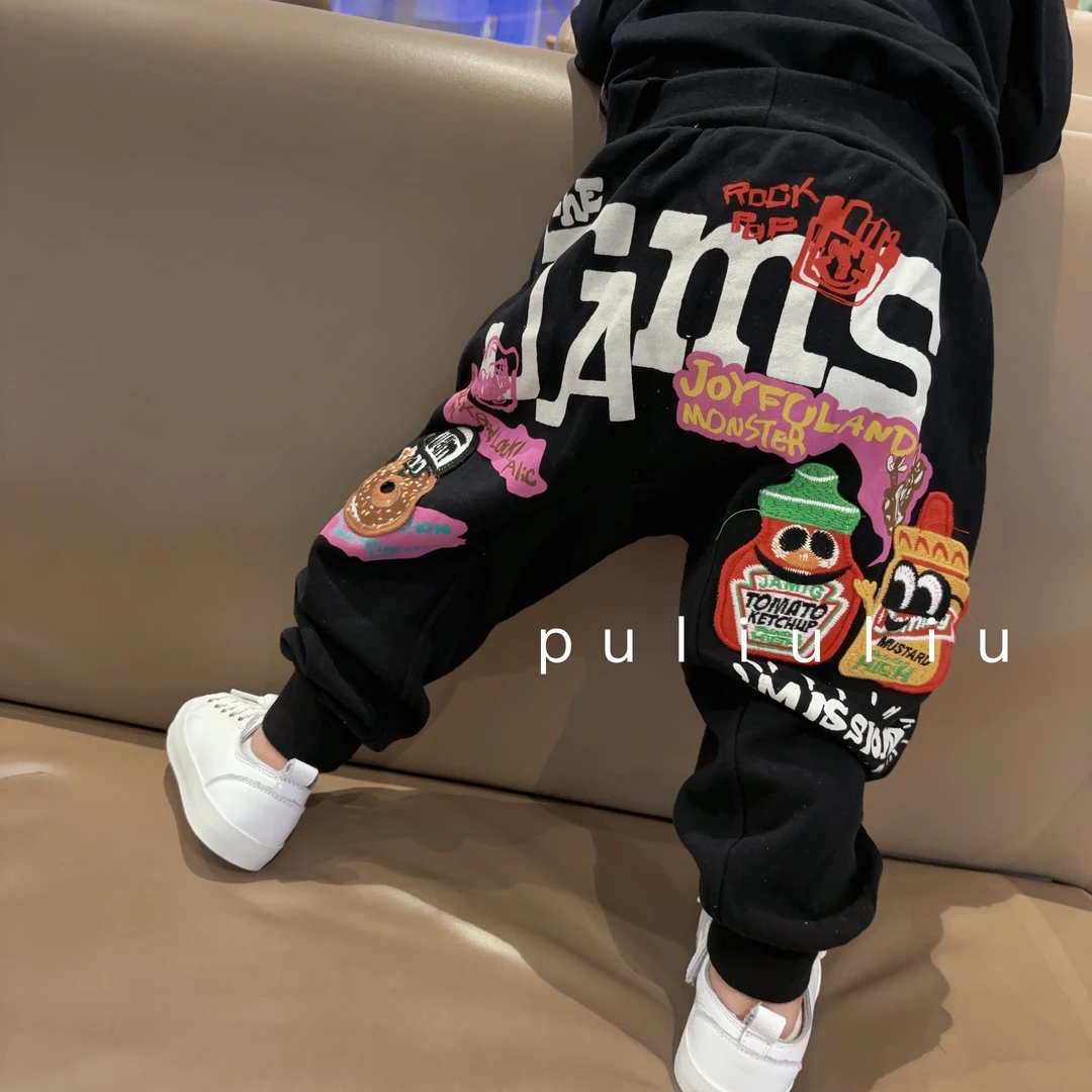 六六高品质童装 男女童日系黑色jm卡通贴布印花大PP裤 毛圈卫裤