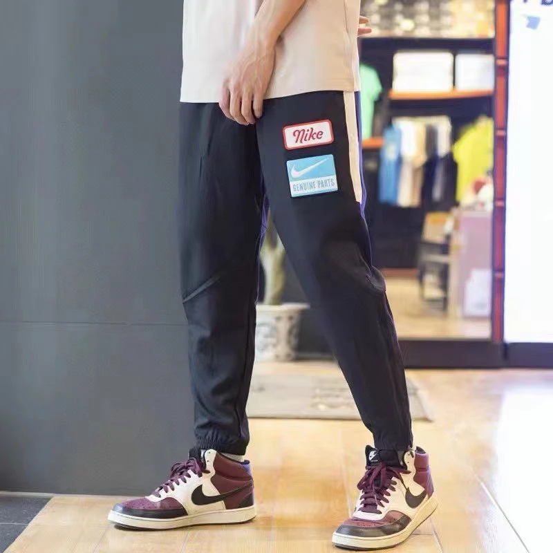 Nike/耐克男子运动跑步训练速干透气梭织是收脚裤DX0889-010