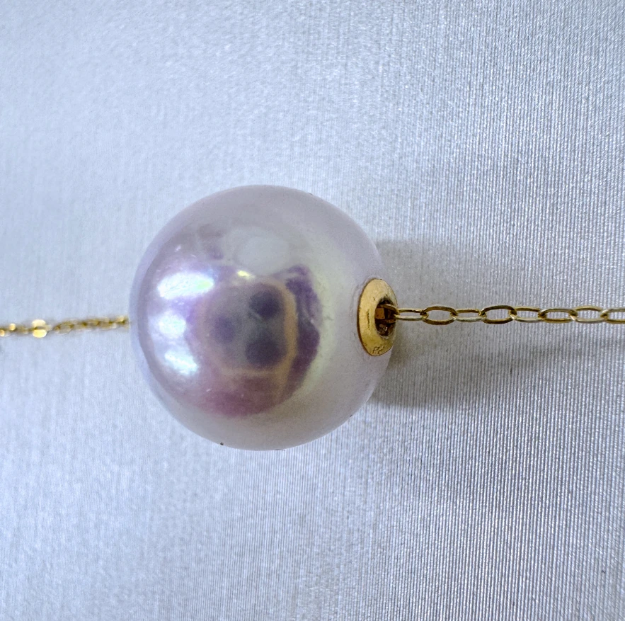 18k金10mm路路通淡水珍珠正圆极强光