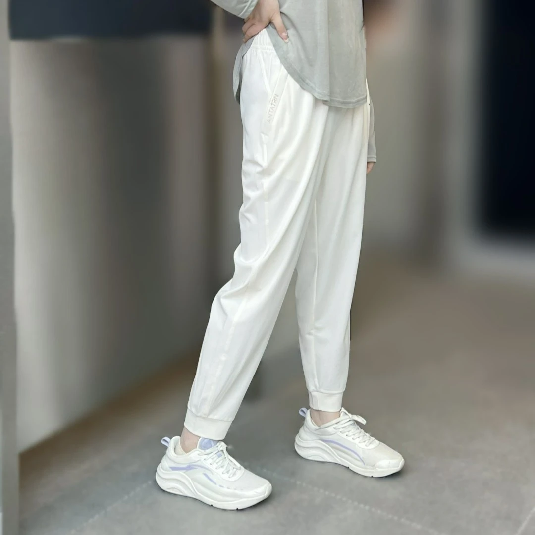 【训练】安踏冰丝裤针织九分裤女子弹力运动休闲百搭卫裤/162337320