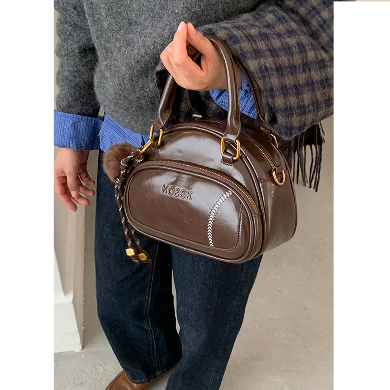 小众保龄球包包女秋冬2025新款时尚复古手提包百搭早八通勤斜挎包