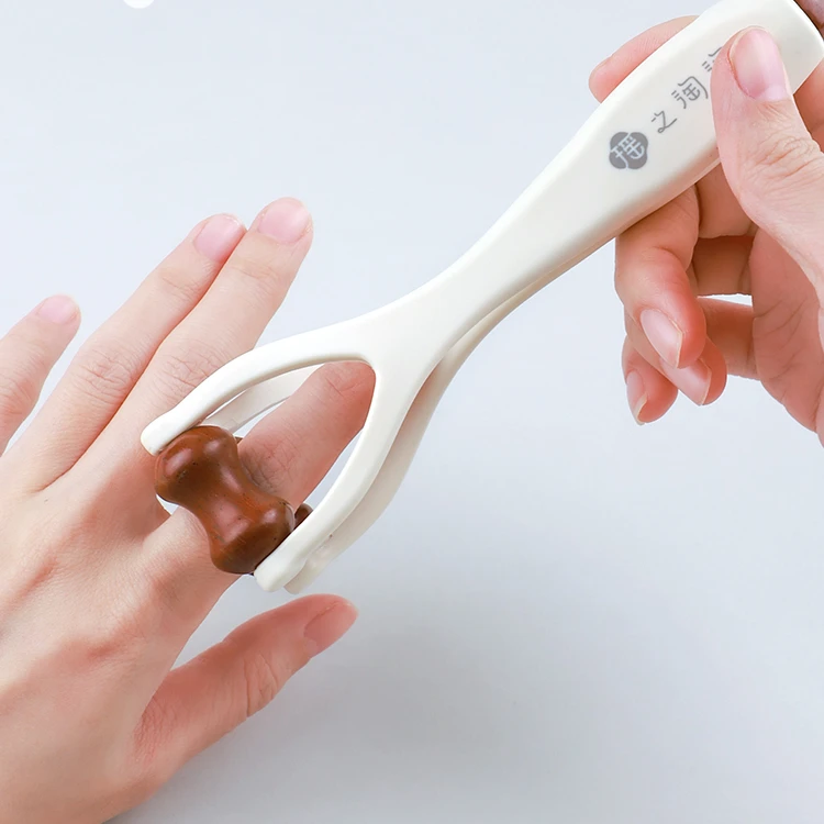 瑶之淘淘手指按摩夹泗水砭石滚轮弹力夹指器居家手部经络养生点穴