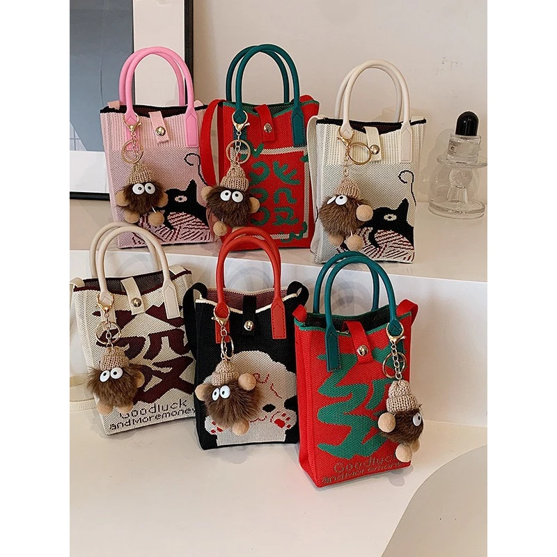 迷你手提小包包2024新款流行编织斜挎针织小众手机包X1