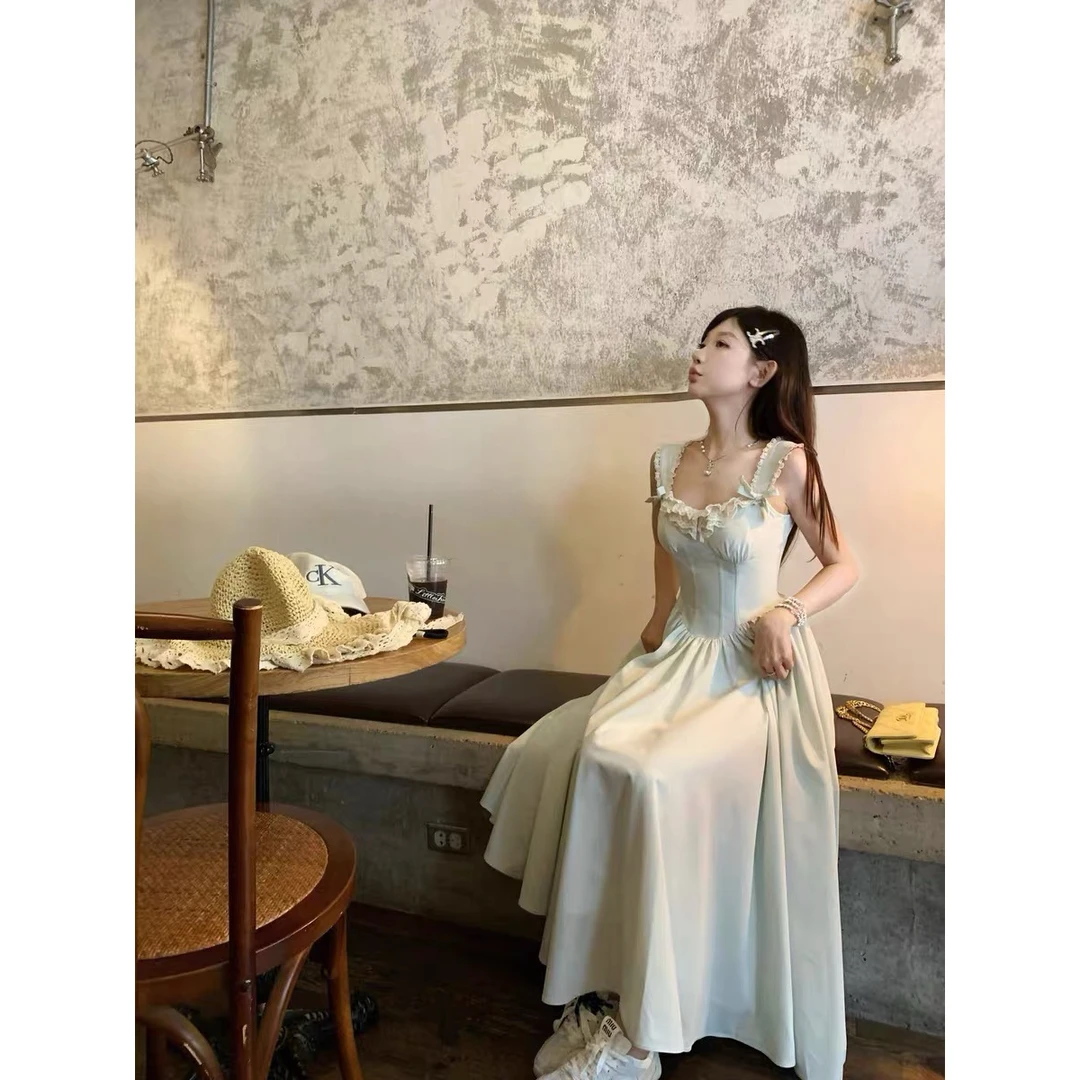 甜美公主裙花边吊带连衣裙女夏季后背绑带露背蝴蝶结收腰中长裙子