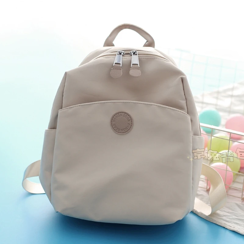 夏天小号双肩包轻便小巧旅行女士小包韩版学生小背包妈咪包带娃