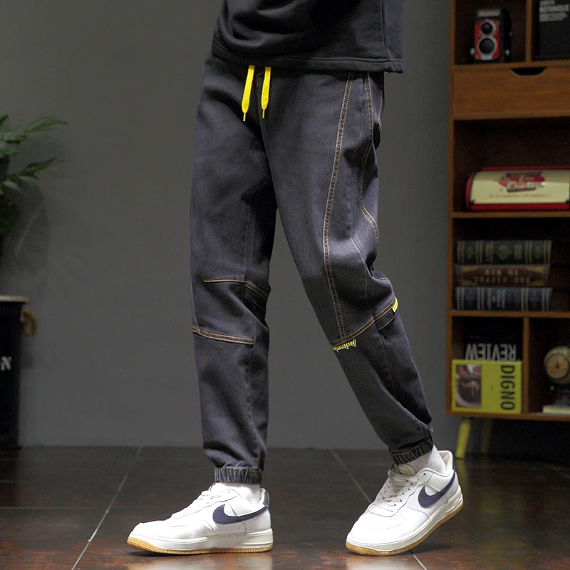 大码春季新款牛仔裤休闲潮流束脚秋冬舒适宽松百搭长裤