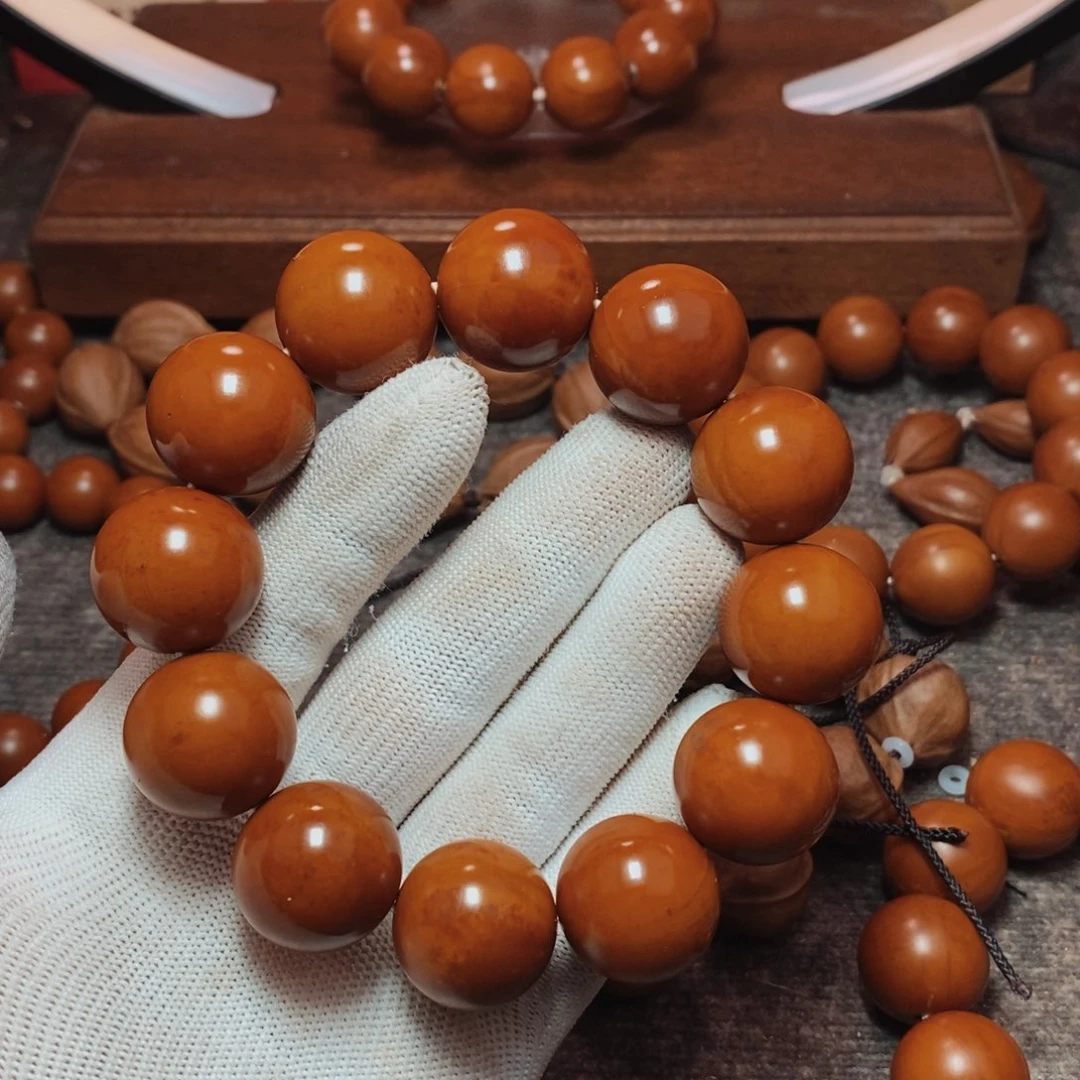 【闪购商品】橄榄核核雕2.1正圆光珠微返油