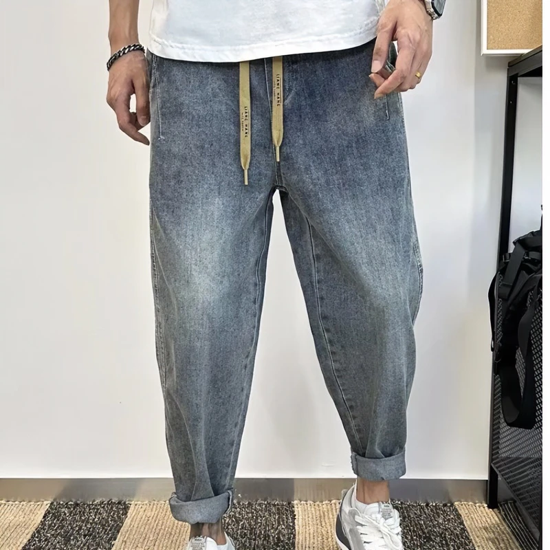 青春流行水洗哈伦裤夏季潮流时尚牛仔裤长裤男文艺潮新款小直脚