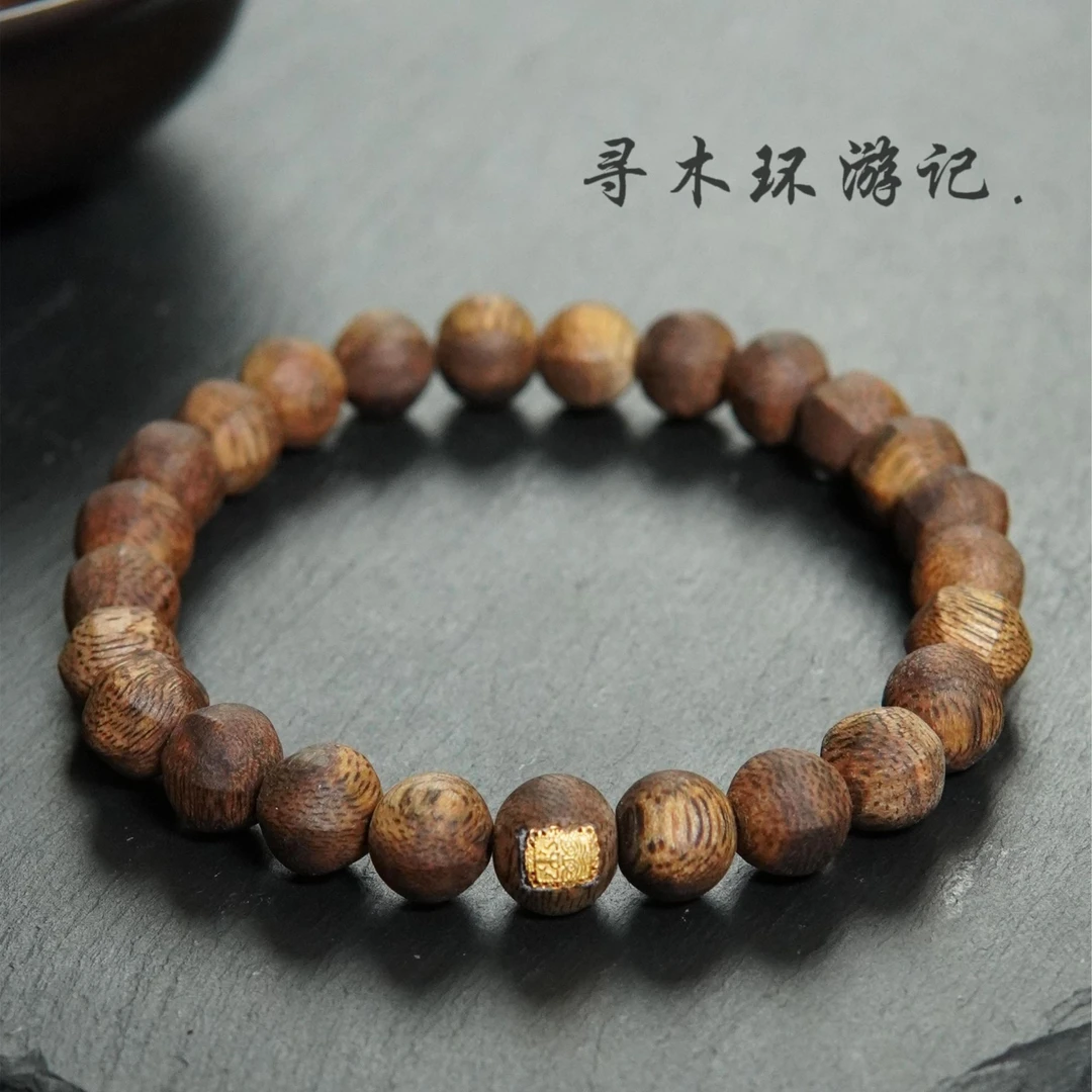 沉香天然莺歌绿棋楠沉香六棱珠8mm扎基拉姆单圈手串