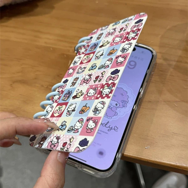 ZMGX满格插画凯蒂猫翻盖笔记本适用苹果16/15手机壳14/13/12女11