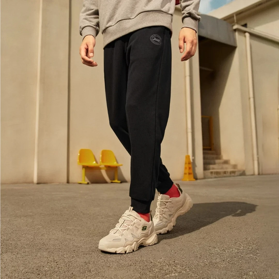 Skechers斯凯奇新款男子舒适运动长裤子简约百搭宽松卫裤L323M101