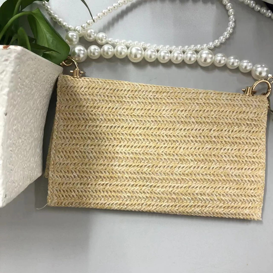 小迪啊~翻盖草编包包