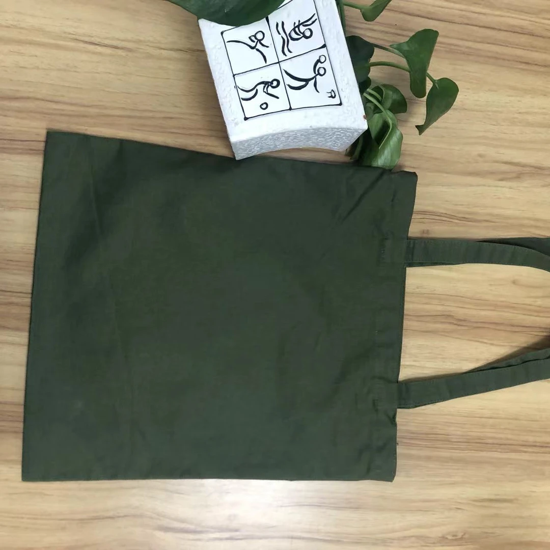 小赛啊~绿色帆布包包