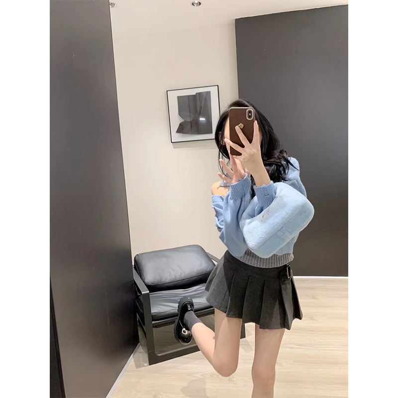 开春穿搭女春秋季韩版甜美温柔小众纯色破洞针织短外套高腰百褶裙