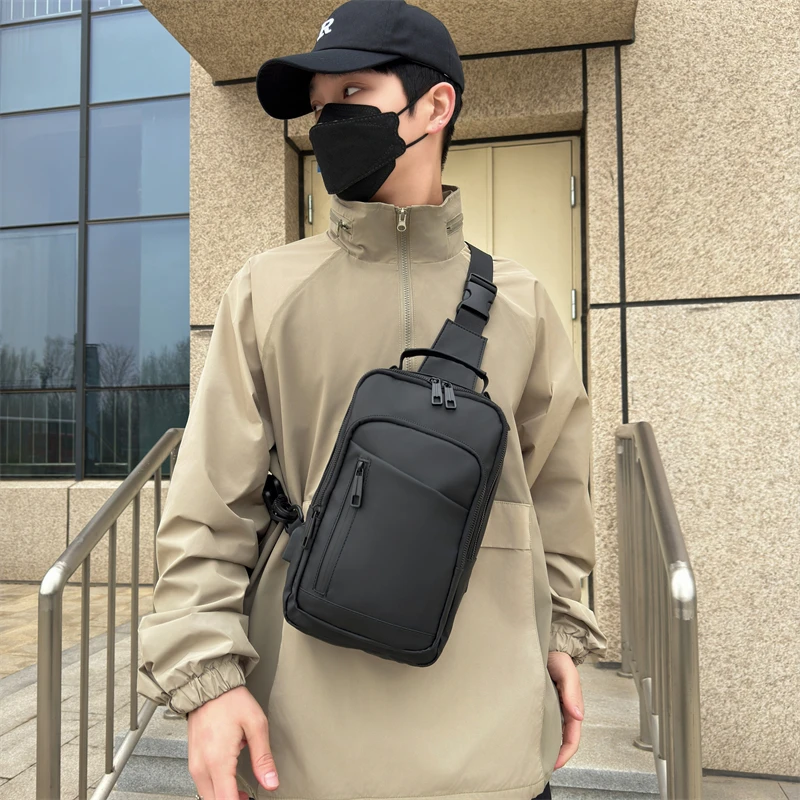 时尚男士包包休闲户外多功能防水胸包商务单肩包斜挎包韩版双肩包