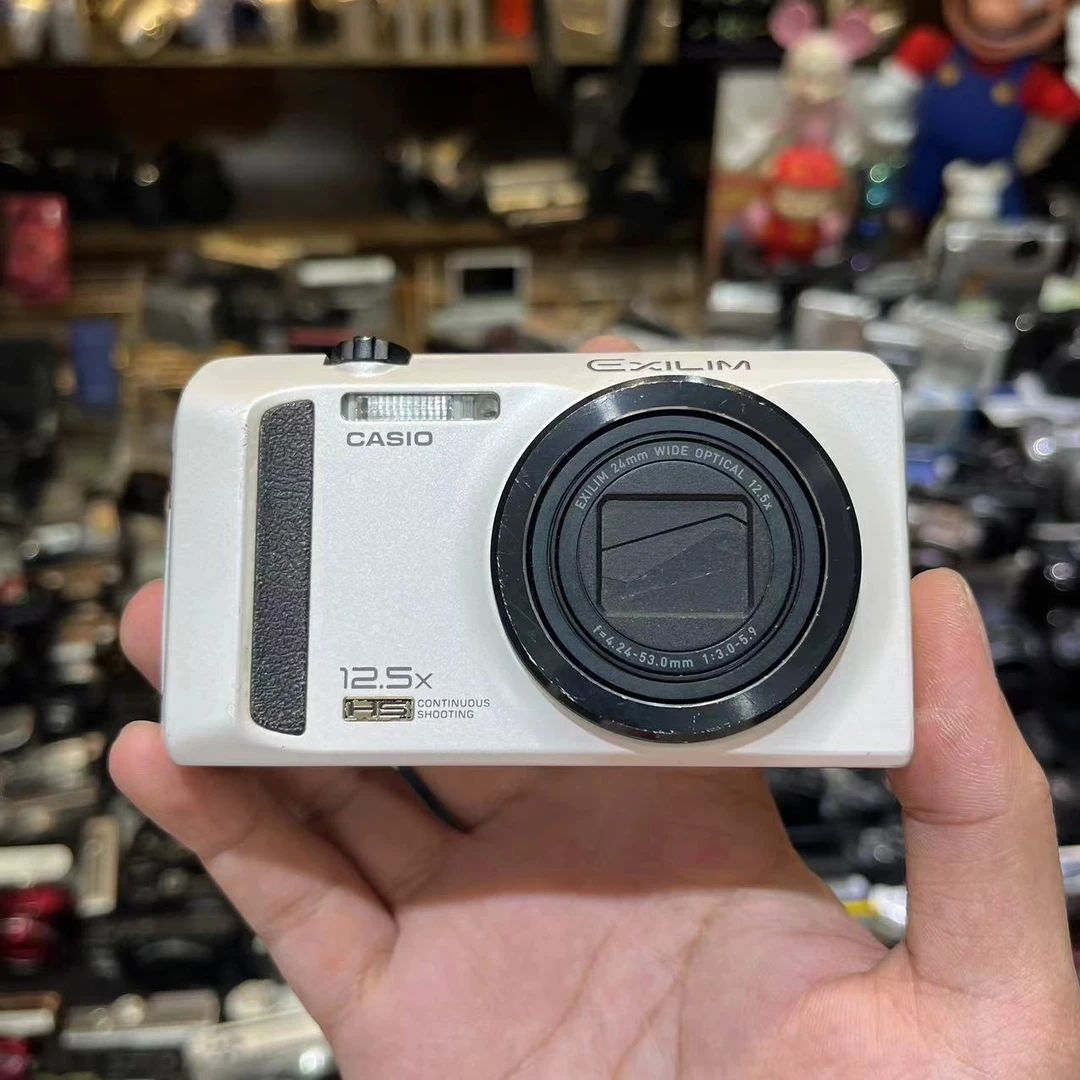 9新 Casio/卡西欧 卡x西欧zr100 屏幕暗角不影响出片配件齐全