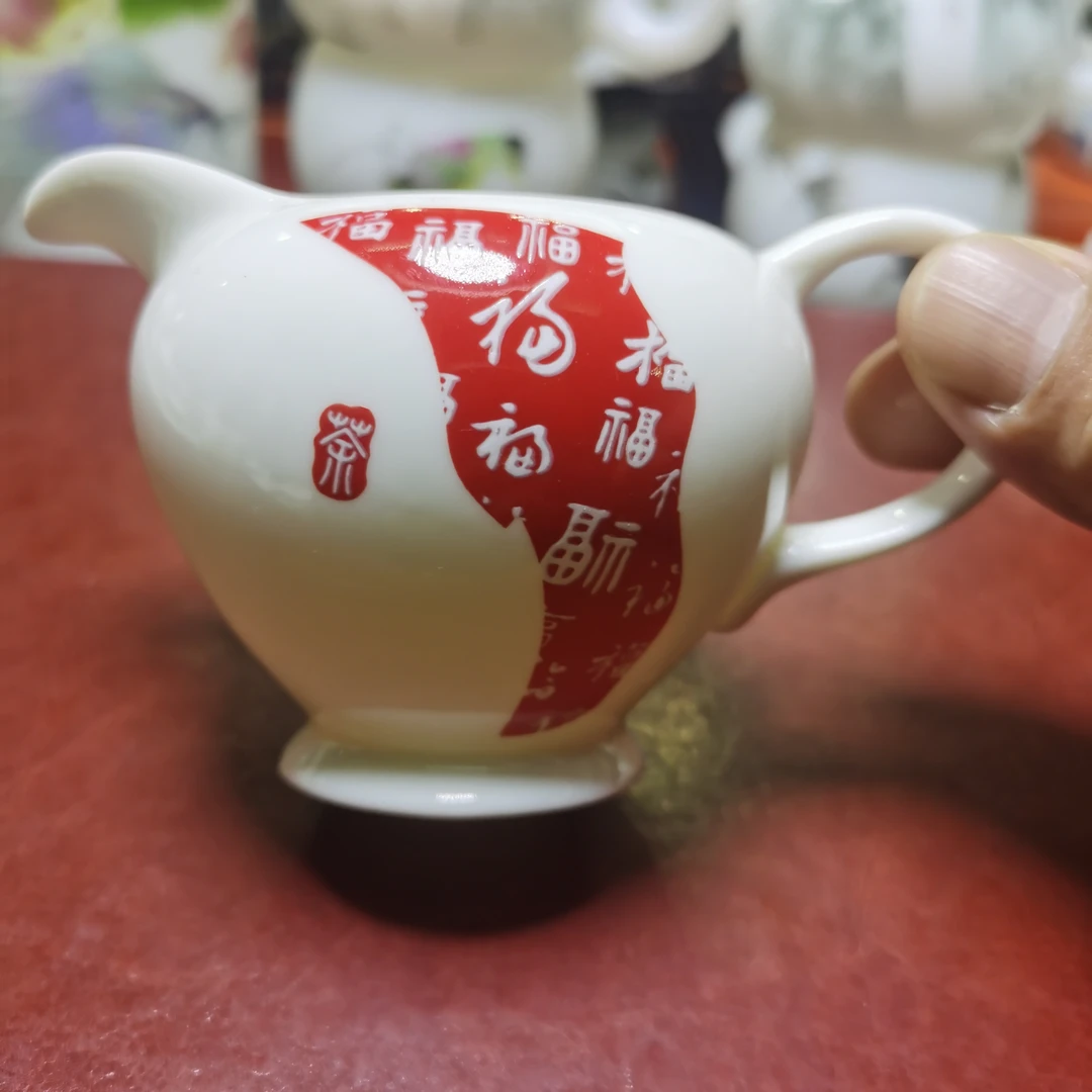 德化白瓷.百福公道杯。