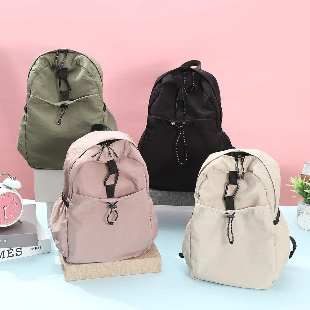 女包超轻帆布书包旅行户外百搭高中生大容量简约双肩包女休闲纯色