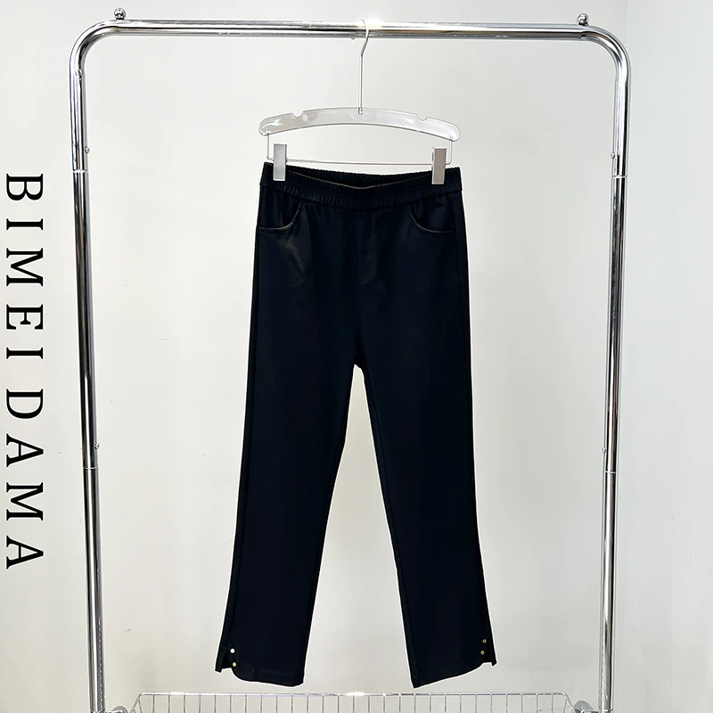 必魅2024时尚新款设计感开叉九分微喇裤6246烟管裤黑色裤大码女装