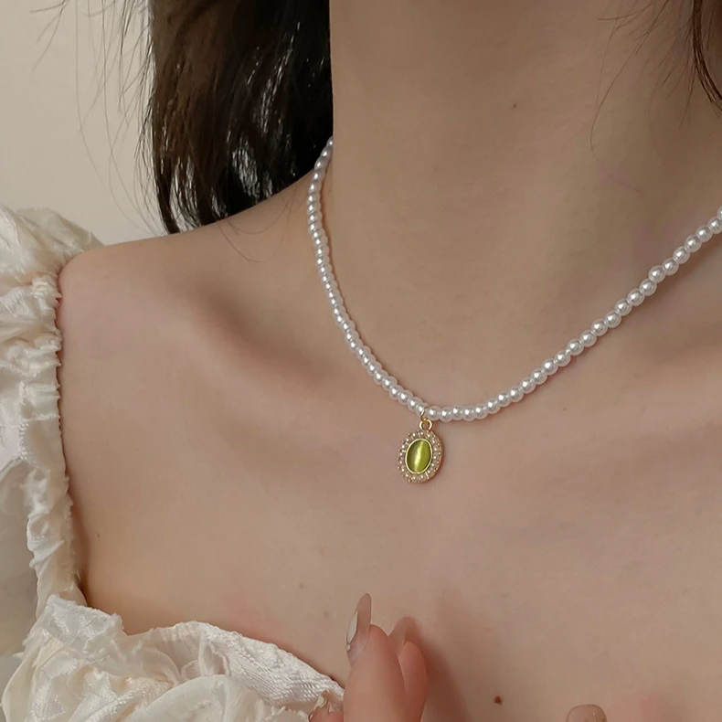 铜合金仿珍珠项链 喵眼石吊坠2024年新款复古锁骨链女高级感颈链