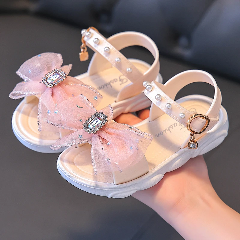 女童蝴蝶结凉鞋2024新款夏季小女孩公主宝宝软底防滑儿童沙滩凉鞋