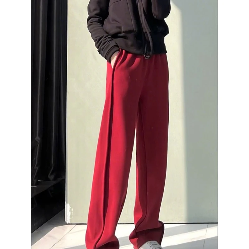 今年流行的红色拖地裤2024年冬季宽松百搭阔腿裤高腰直筒裤子长裤