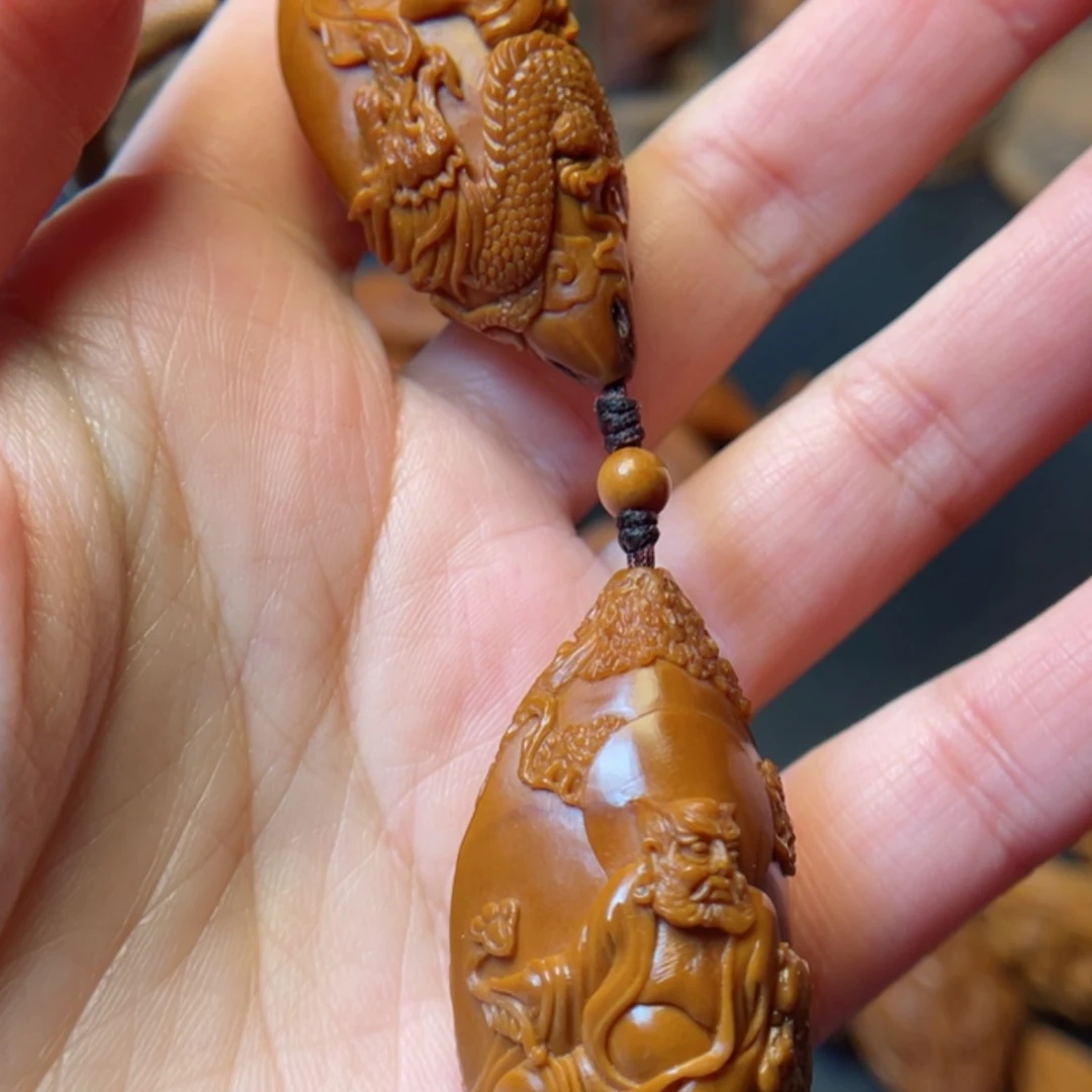 【闪购商品】橄榄核吊坠孤****山