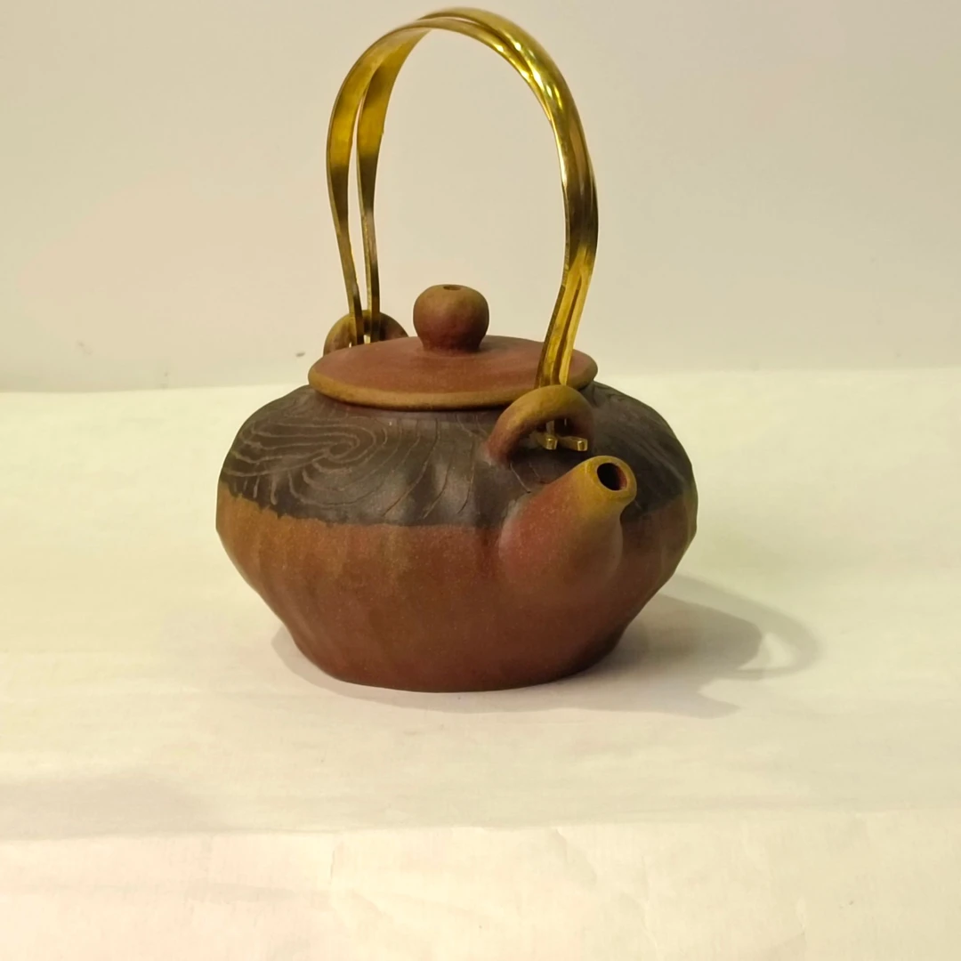 九曲蕴陶黄河泥陶手捏提梁壶黄河古韵