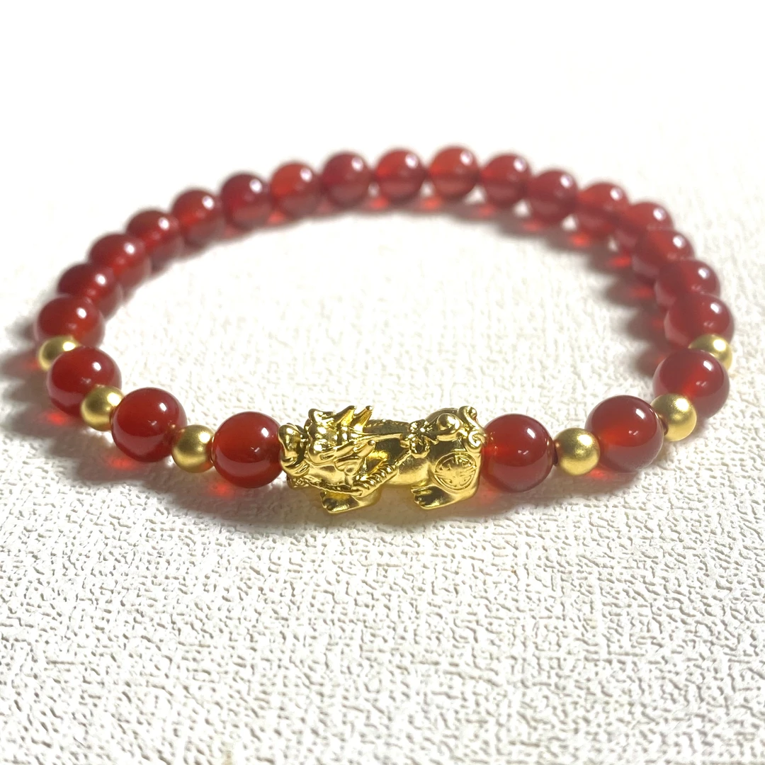 一赞  足金999中貔貅+6颗卡4古法搭红玛 瑙手串@@A242