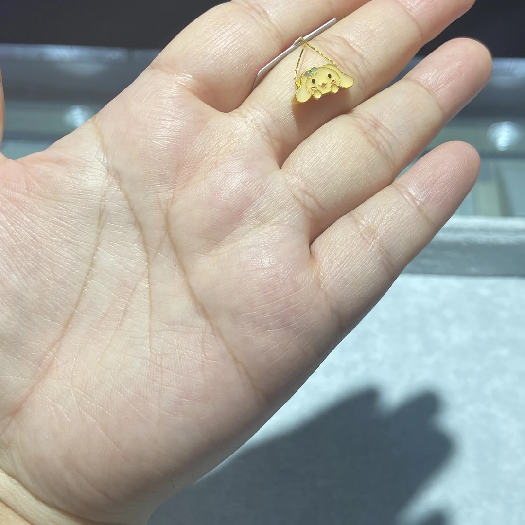 足金999 珐琅彩大耳狗四通 1.928