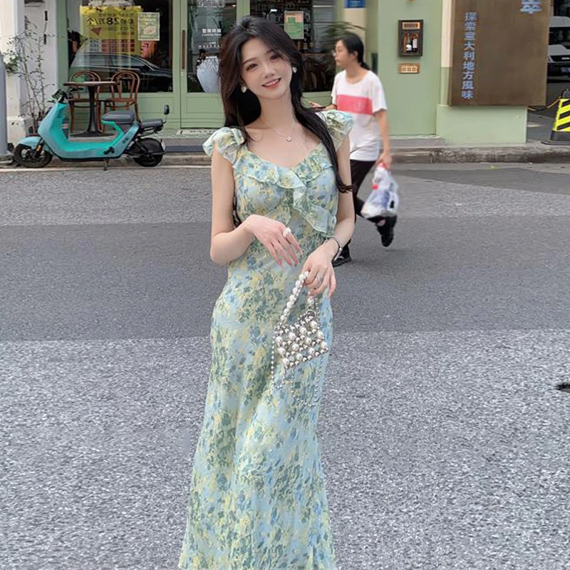 C512法式气质碎花吊带连衣裙子女装夏季海边度假沙滩收腰长裙