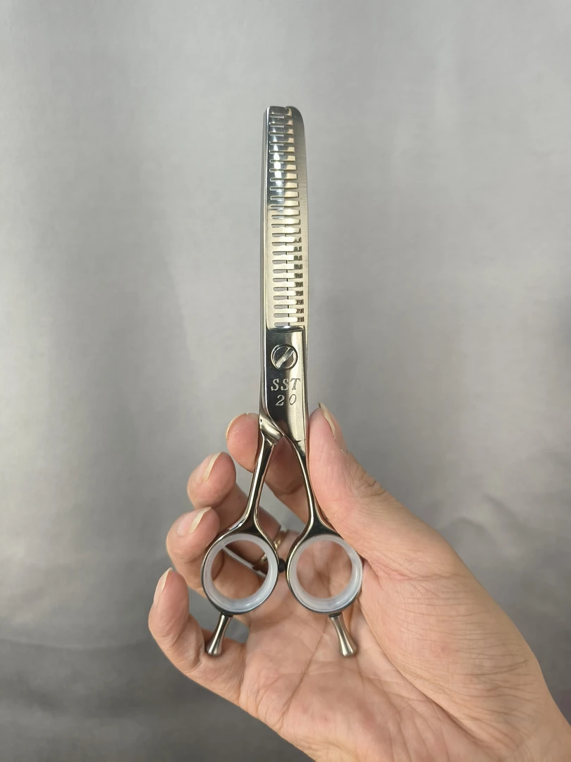 日本美发剪刀:阿寇斯牙剪去量25%左右成色如新