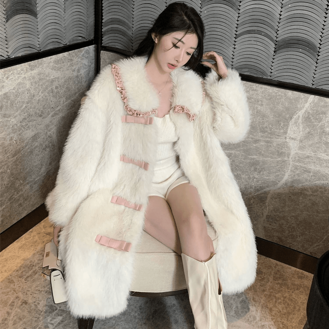 轻奢风蝴蝶结毛毛托斯卡纳2023年轻款长款皮毛一体外套女