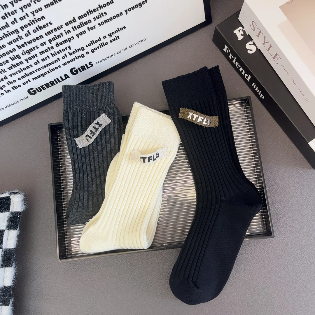 秋冬加厚斜条小布标韩版简约百搭潮袜纯色高腰外穿时尚网红堆堆袜