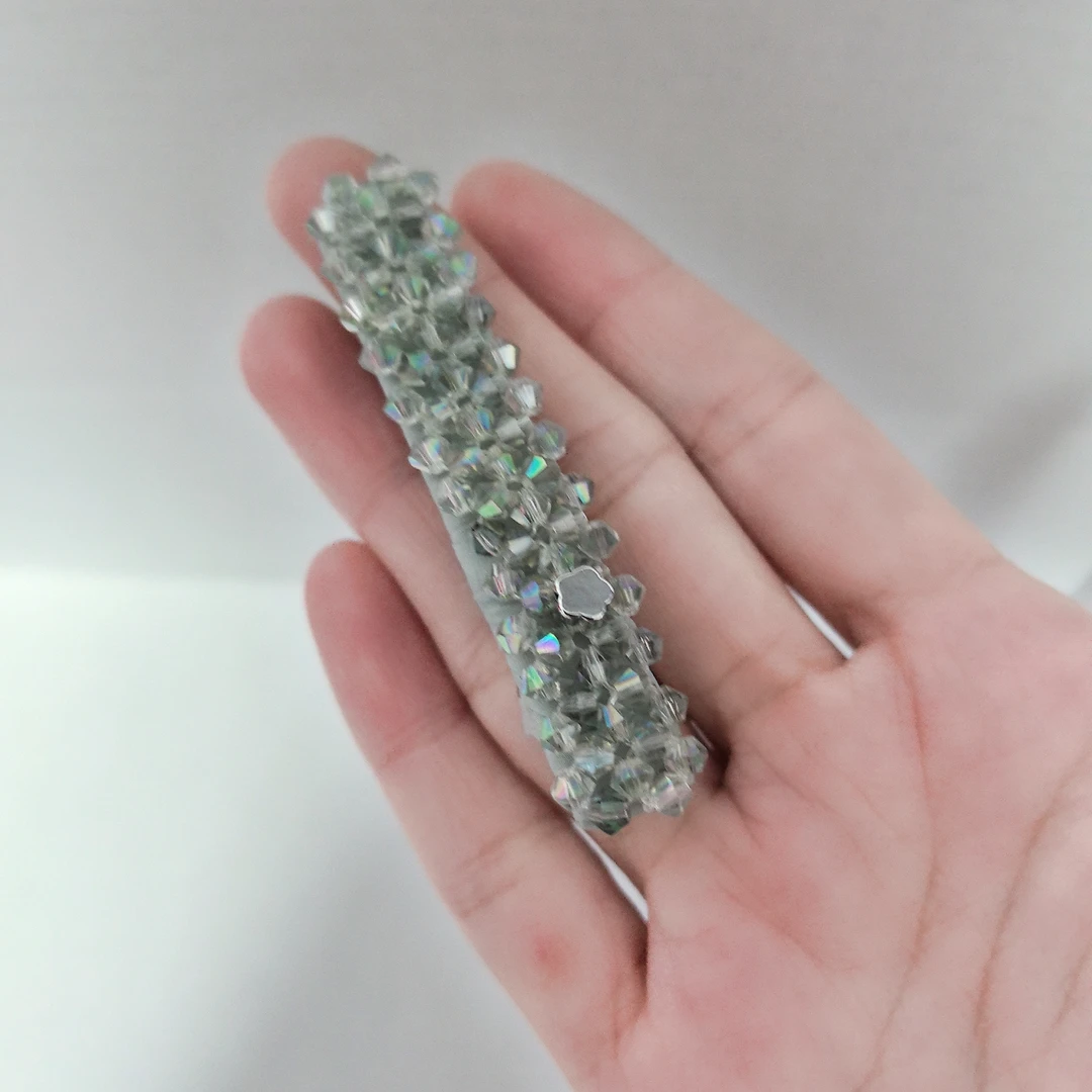 西子夹录影边夹晶石