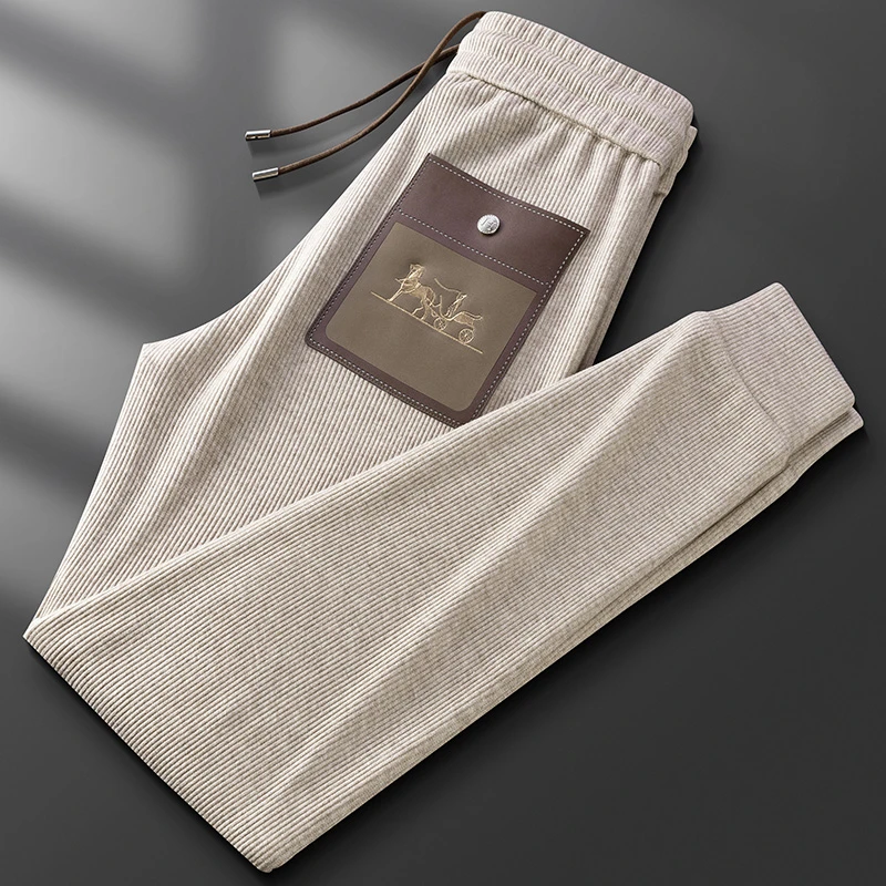 秋冬轻奢品质口袋贴皮束脚卫裤男高端条纹绒保暖休闲男士九分裤