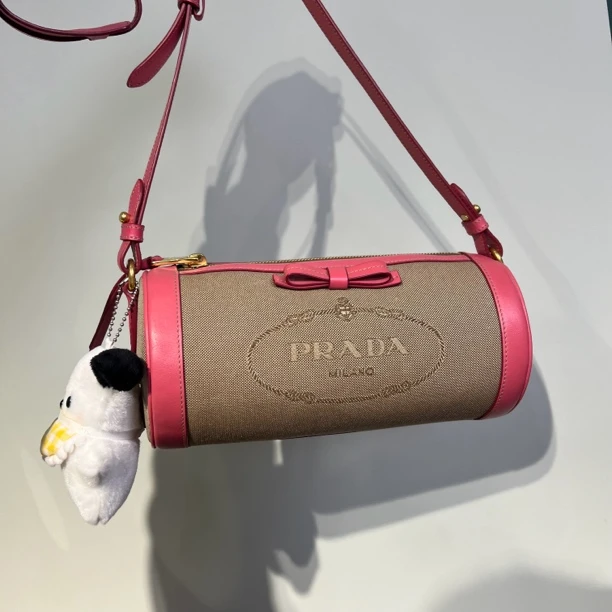 95新 Prada/普拉达 粉色蝴蝶结巴比龙斜挎包