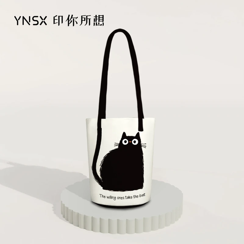 原创长尾黑猫单肩水桶包休闲百搭简约潮流小众学生新款帆布包ZZQ