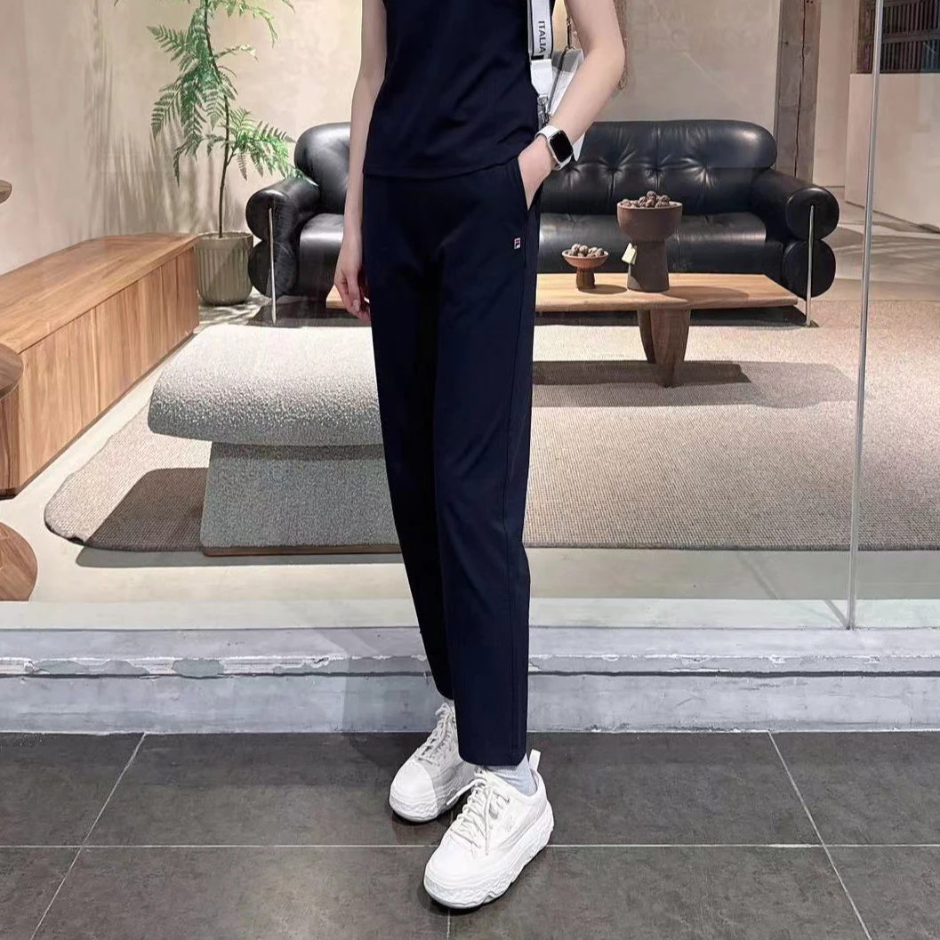 FILA/斐乐女士凉感显瘦遮肉户外休闲透气宽松运动裤黑F11W421603F