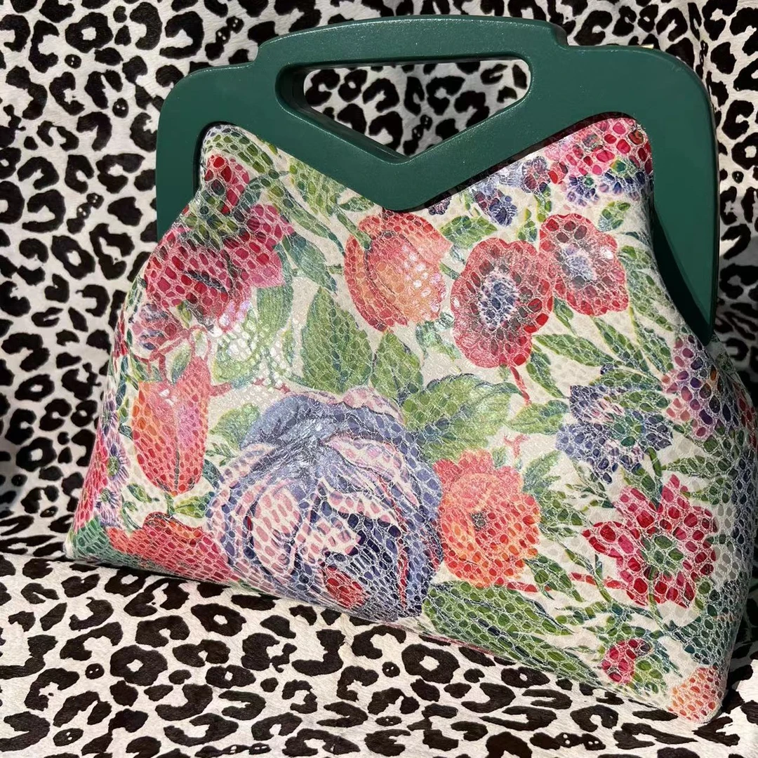 旗袍休闲时尚搭配牛皮里外全皮手工口金女包