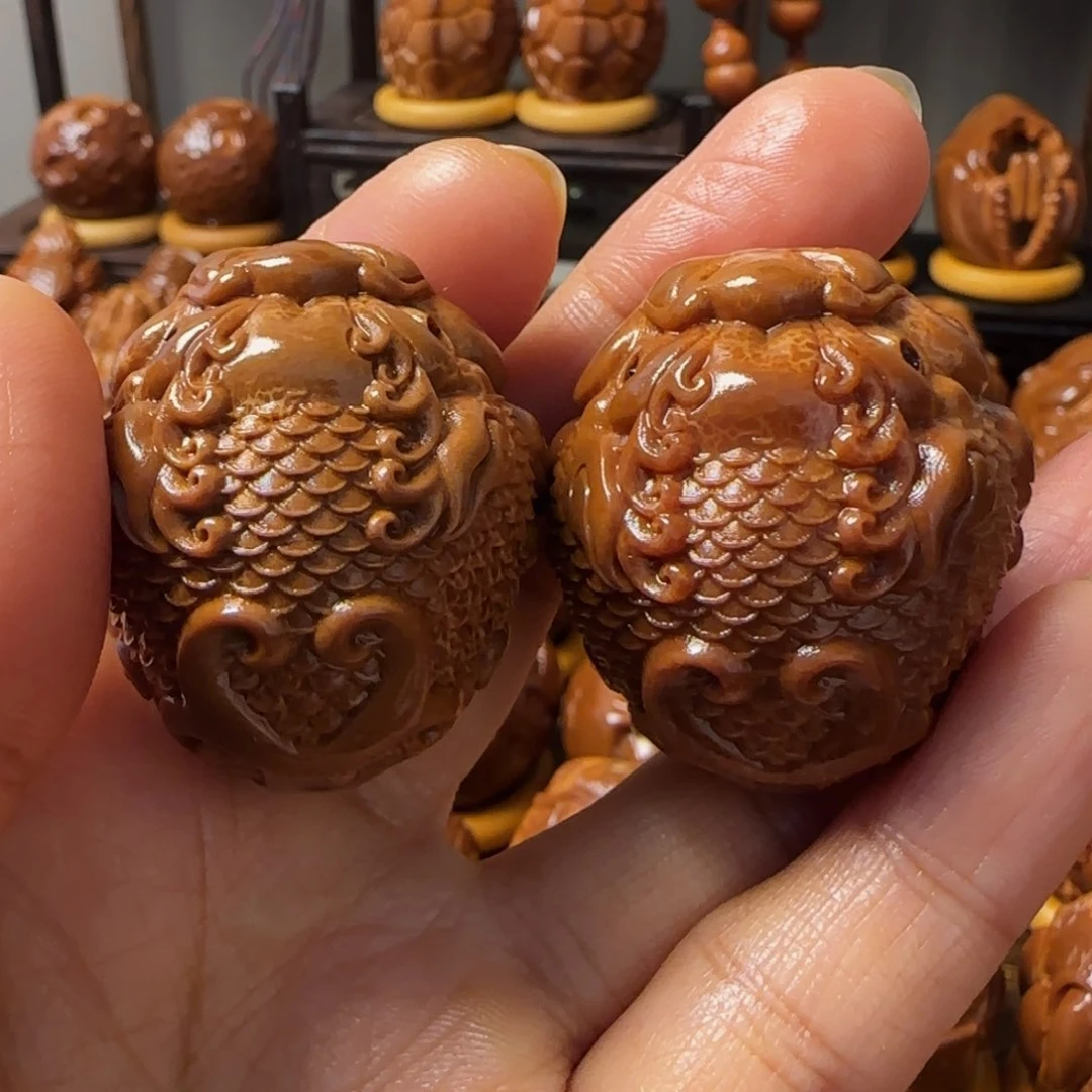 橄榄核把件承**航貔恘手把件不送油和刷