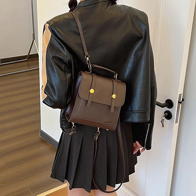 包包女2025新款英伦美式复古搭扣双肩包学生斜挎单肩通勤包小众
