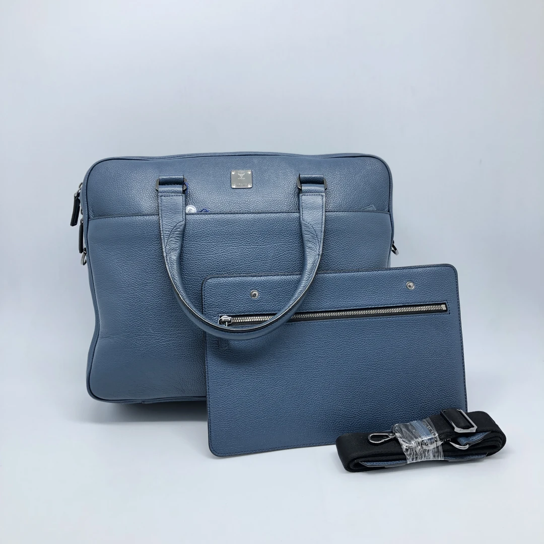 95新 MCM MCM水雾蓝色荔枝纹手提包/1815号男士男款时尚蓝色真皮