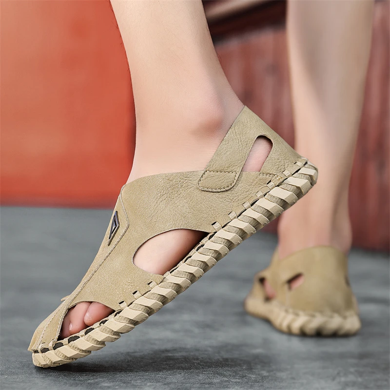 沙滩鞋男款2024新款镂空透气软底手工编织罗马鞋户外防滑海边凉鞋