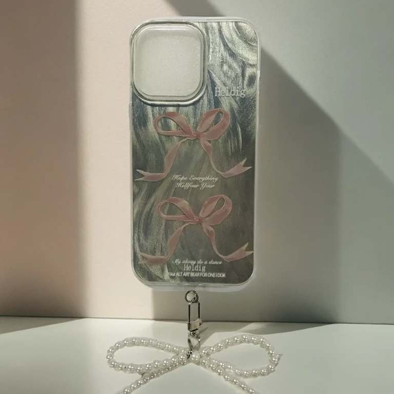 潮牌网红新款粉色蝴蝶结大孔羽毛手机壳不包摄像头个性